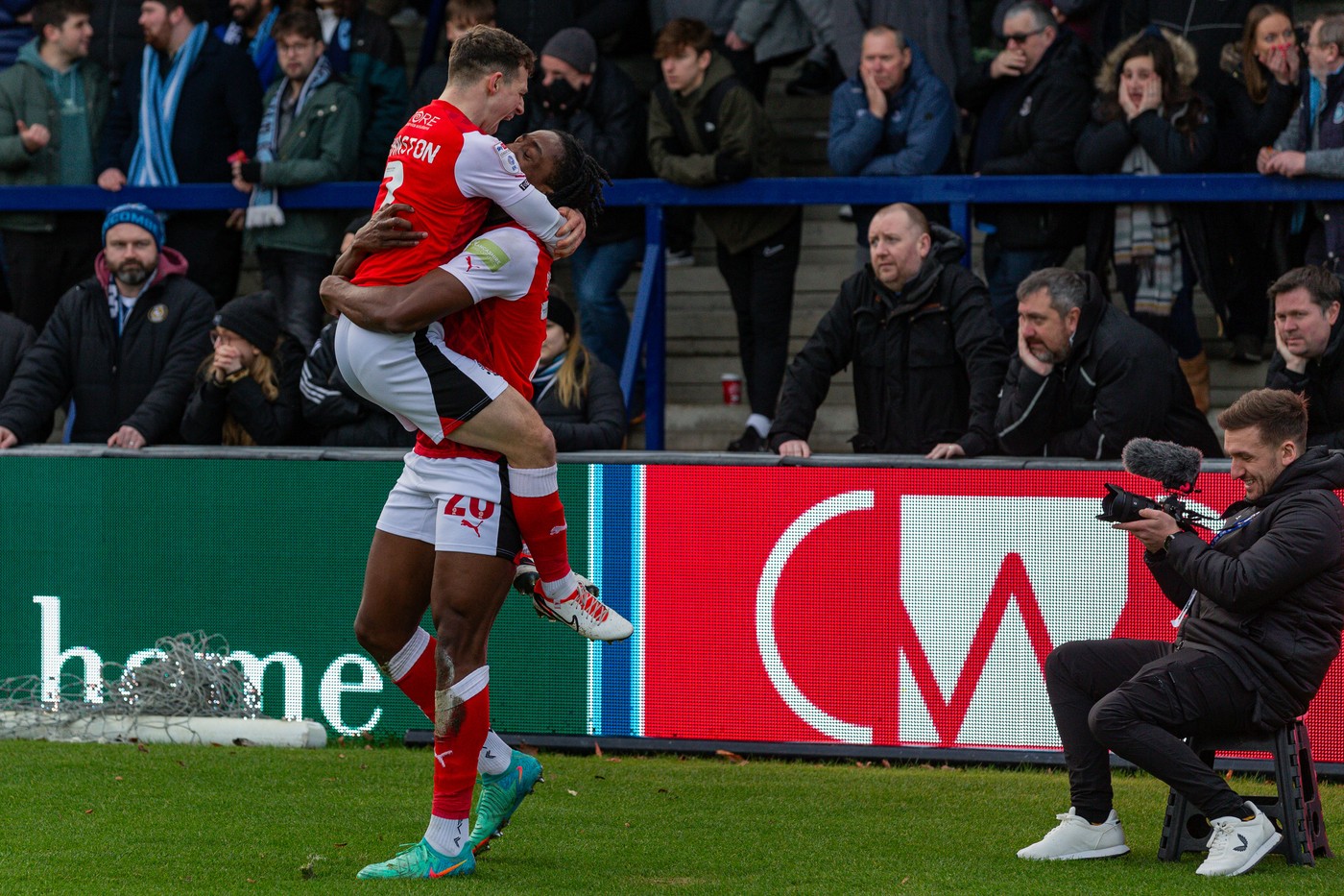 Ryan Deane pitchside filming at Wycombe Wanderers for Fleetwood Town