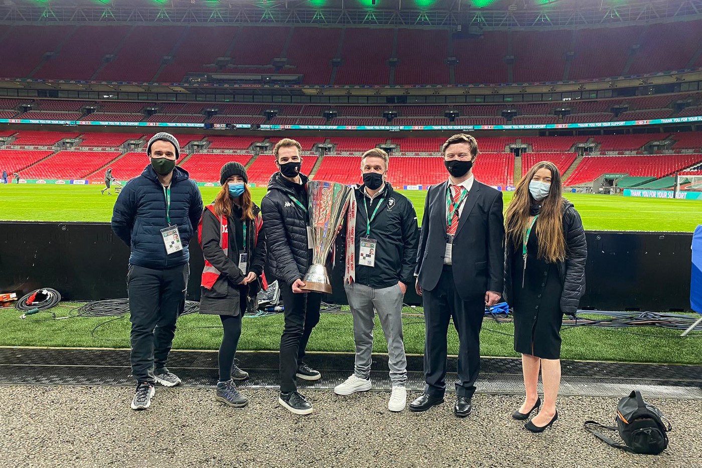 Ryan Deane with Salford City media team after winning EFL Trophy