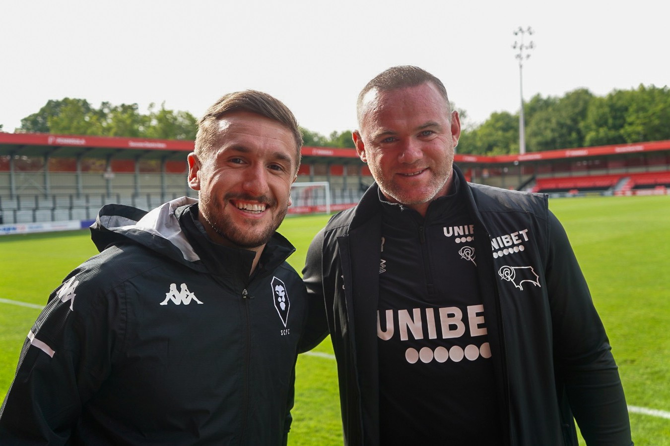 Ryan Deane with Wayne Rooney